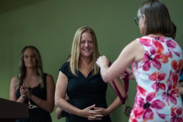 NIC surgical technology graduate Tracy Giles, left, receives an excellence award from NIC Surgical Technology Program Director Terra Lawson-Gilbert during a pinning ceremony on July 11 at the Lake Coeur d’Alene Room of the Edminster Student Union Building on NIC’s Coeur d’Alene campus.